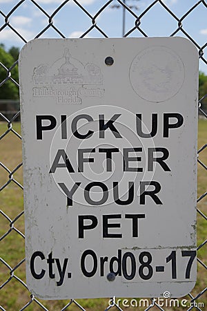 Tampa, Florida / USA - May 5 2018: Pick Up After Your Pet Sign Editorial Stock Photo