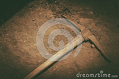 Pickaxe on the Ground Stock Photo