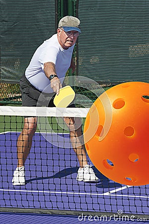 Pickleball Action -Big Backhand Stock Photo