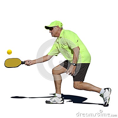 Pickleball Action - Senior Male Player Hitting Forehand Stock Photo