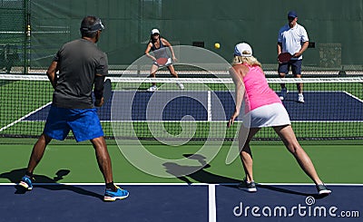 Pickleball - Mixed Doubles Action Stock Photo