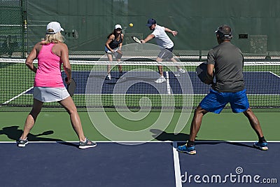 Pickleball - Mixed Doubles Action Stock Photo