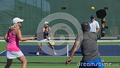 Pickleball - Mixed Doubles Action Stock Photo