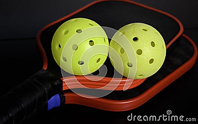 Pickleball paddles and pickleballs Stock Photo