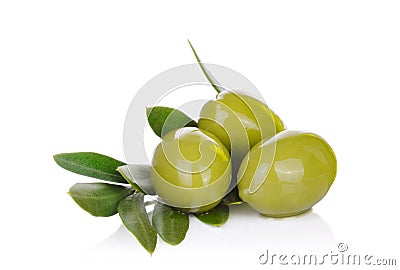 Pickled green olives and olive tree branch on a white Stock Photo