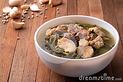 Pickled lettuce soup with pork belly soup Stock Photo