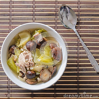Pickled lettuce soup with shiitake mushroom and pork Stock Photo