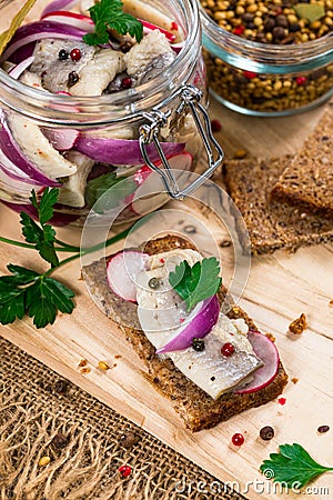 Pickled Marinated Herring with Spices Stock Photo