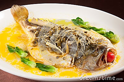 Pickled steamed yellow croaker Stock Photo