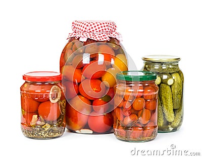 Pickled tomatoes and cucumbers isolated on white Stock Photo