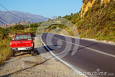 Pickup truck on mountain road Stock Photo