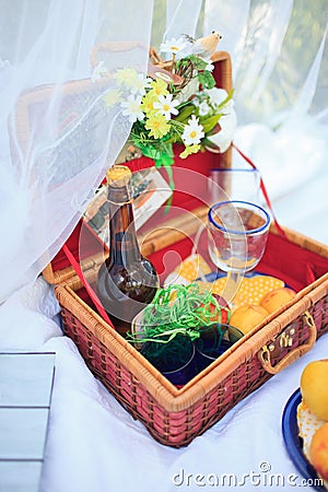 Picnic basket - fruits, bread and wine Stock Photo