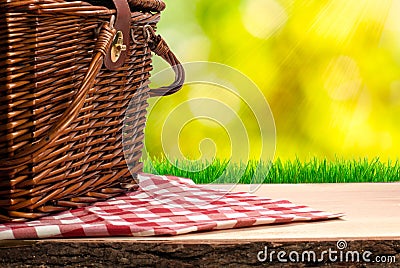 Picnic basket on the table Stock Photo