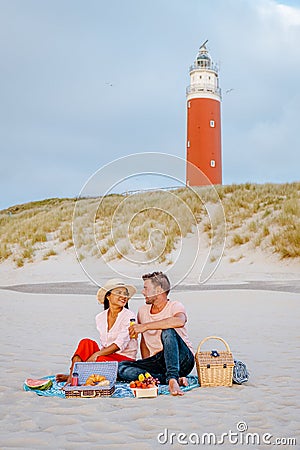 Picnic on the beach Texel Netherlands, couple having picnic on the beach of Texel Stock Photo