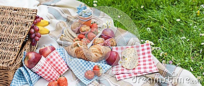 Picnic in the celebration of the king`s day. Lunch in the garden. Orange accessories. Spring in the Netherlands. Postcard and text Stock Photo