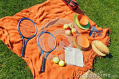 Picnic items on a green, well-groomed lawn Stock Photo