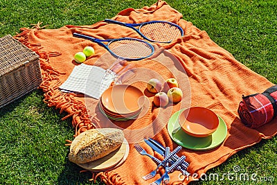 Picnic items on a green, well-groomed lawn Stock Photo