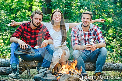 Picnic time. Friends camping concept. Tourists relaxing. Company friends enjoy relaxing together in forest. They are Stock Photo