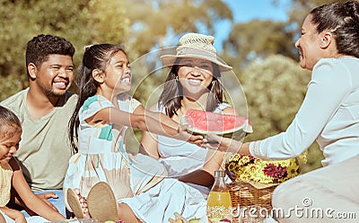 Picnic, watermelon and happy family in park with summer fruits for wellness, outdoor holiday and health with children Stock Photo