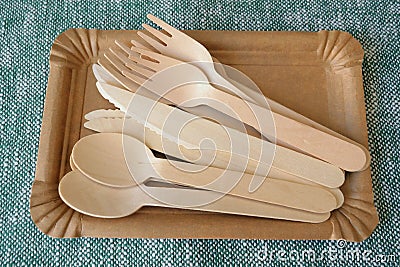 Picnic wooden cutlery and paper plates. Natural materials. Eco friendly Stock Photo