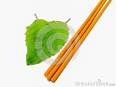 A picture of agarbatti on white surface , Stock Photo