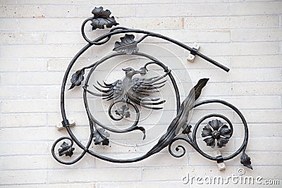 Black iron bird wall mount Stock Photo