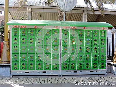 Lockers for valuable things in the path between Holy Shrine of Husayn Ibn Ali and Abbas Ibn Ali, Karbala, Iraq Editorial Stock Photo