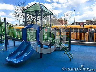 Children`s Playground with School buses Editorial Stock Photo