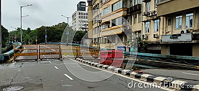 A picture of closed Kemps Corner Flyover near Peddar Road with Mumbai police barricade during the lockdown in Mumbai. Editorial Stock Photo