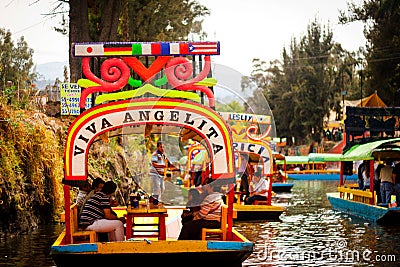 Picture of the colorful boats on ancient Aztec canals at Xochimilco in Mexico. Trajineras. Editorial Stock Photo