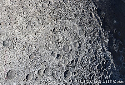 A picture of craters on the surface of the moon Stock Photo