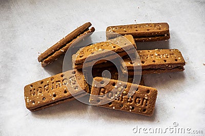 Picture of creamy and chocolatey bourbon biscuits on white background Stock Photo