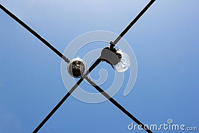 Crossing lines with light bulbs Stock Photo