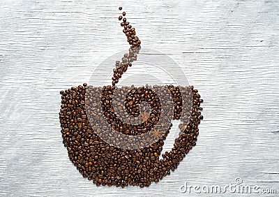 Picture a cup of coffee made from beans on the board Stock Photo