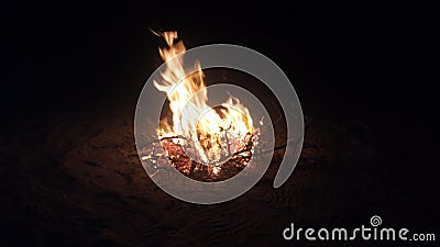 A picture of a flame in the desert trying to make tea Stock Photo