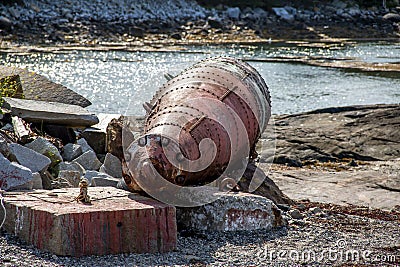 Giant rusty metal buoy near the ocean Stock Photo