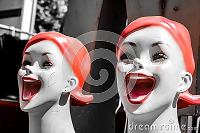 Happy faces on mannequins Stock Photo