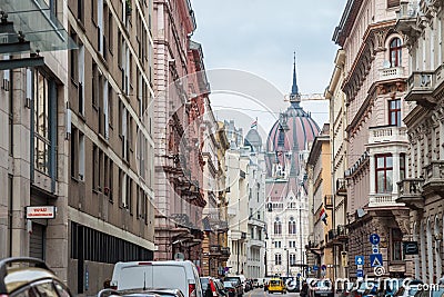 Hungarian Parliament orszaghaz seen from a nearby street. It is one of the main touristic landmarks of the city Editorial Stock Photo