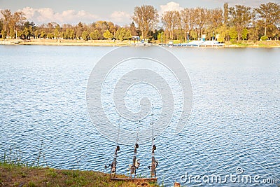 Panorama of bela crkva lakes at dusk with calm water, fishing rods and sunny sky. Also called Belocrkvanska jezera, they are Stock Photo