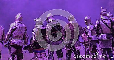 Medieval Knights set against an ultra violet background Editorial Stock Photo