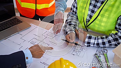 Picture of a meeting between the contractor and the owner of the construction project. Renovate of the new building structure Stock Photo