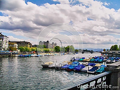 Picture of Motorboat at the pier in cloudy day. Stock Photo