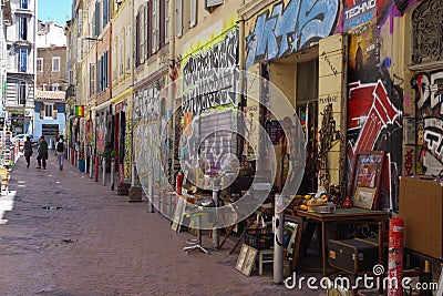 Picture of an original antique shop in the middle of a pedestrian street in the sixth district of Marseille. Editorial Stock Photo