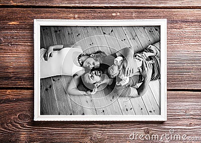 Picture of parents holding baby daughter. Fathers day. Stock Photo