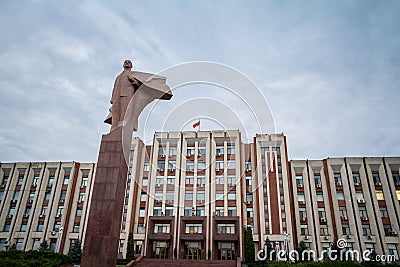 Transnistria Parliament building in Tiraspol with a statue of Vladimir Lenin in front Stock Photo