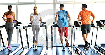 Picture of people running on treadmill in gym Stock Photo