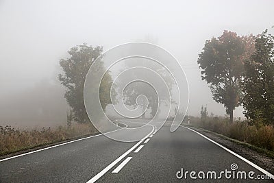 Picture presenting foggy road Stock Photo