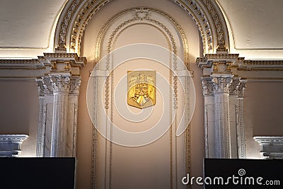 Selective blur on the coat of arms of romania on a wall in Bucharest Romania, made of gold. The romanian coat of arms, adopted by Editorial Stock Photo