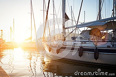 Picture of row of sailboats reflected in water Stock Photo