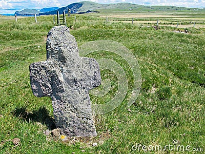 Rugged Stone Cross at St. Brendan`s Well Kerry Stock Photo